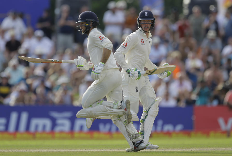 England's Keaton Jennings, right, and Ben Foakes run between wickets during the third day of the first test cricket match between Sri Lanka and England in Galle, Sri Lanka, Thursday, Nov. 8, 2018. (AP Photo/Eranga Jayawardena)