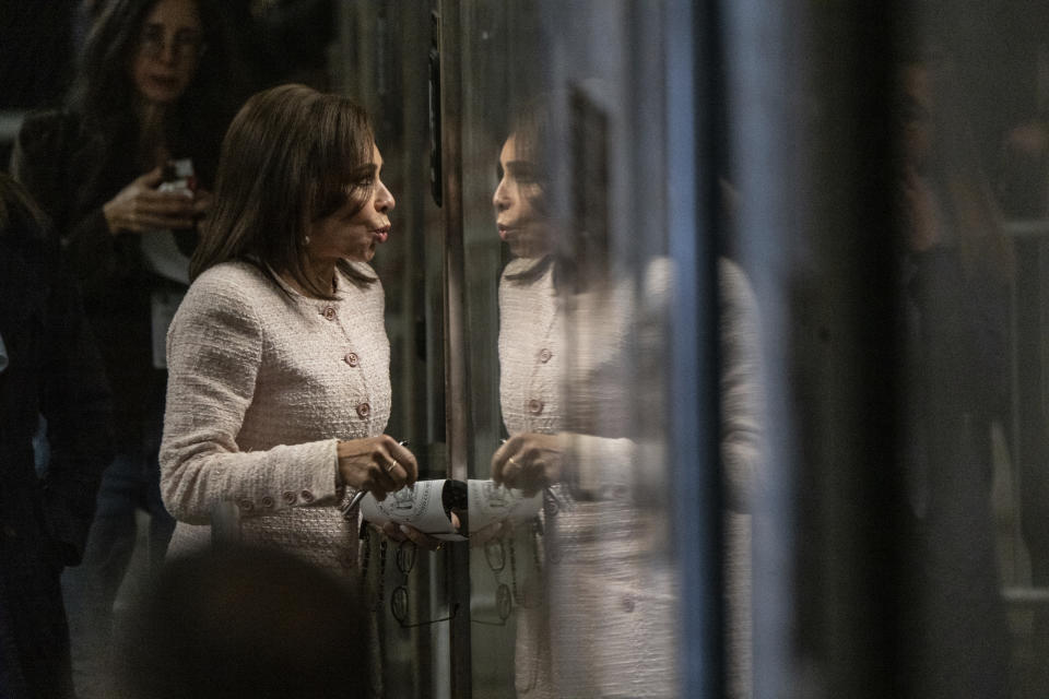 Jeanine Pirro stands outside the courtroom during a break in the hush money trial.