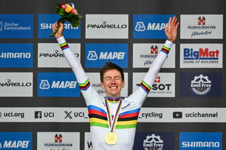 Tadej Pogacar donned the rainbow jersey for the first time after his world title (Fabrice COFFRINI)