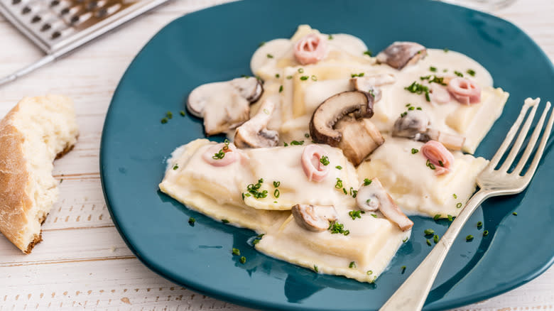 White ham sauce over ravioli