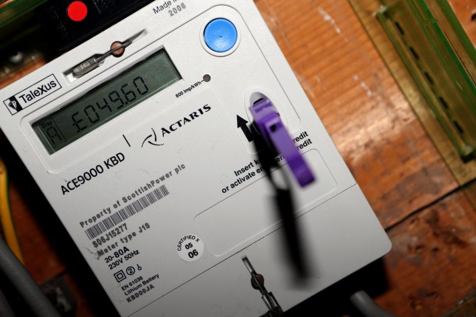 Prepayment customers top up their meter cards at local shops (Peter Byrne/PA) (PA Archive)