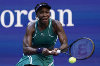 FILE - Venus Williams returns a shot to Alison Van Uytvanck, of Belgium, during the first round of the U.S. Open tennis championships, Tuesday, Aug. 30, 2022, in New York. Venus Williams is expected to compete at Wimbledon next week. (AP Photo/Seth Wenig, File)