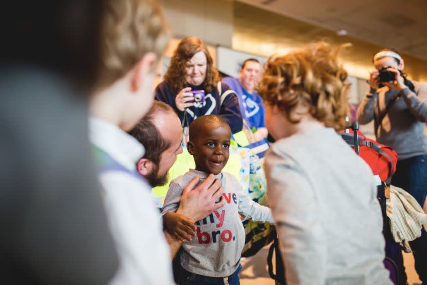 "This strong family accepted S's referral at&nbsp;5 days old, but he finally came home from Democratic Republic of the Congo, three years later. S only got on the airplane to make his long journey with the promise that his big brother was on the other side."&nbsp;-- Brandi-lin Ebersole