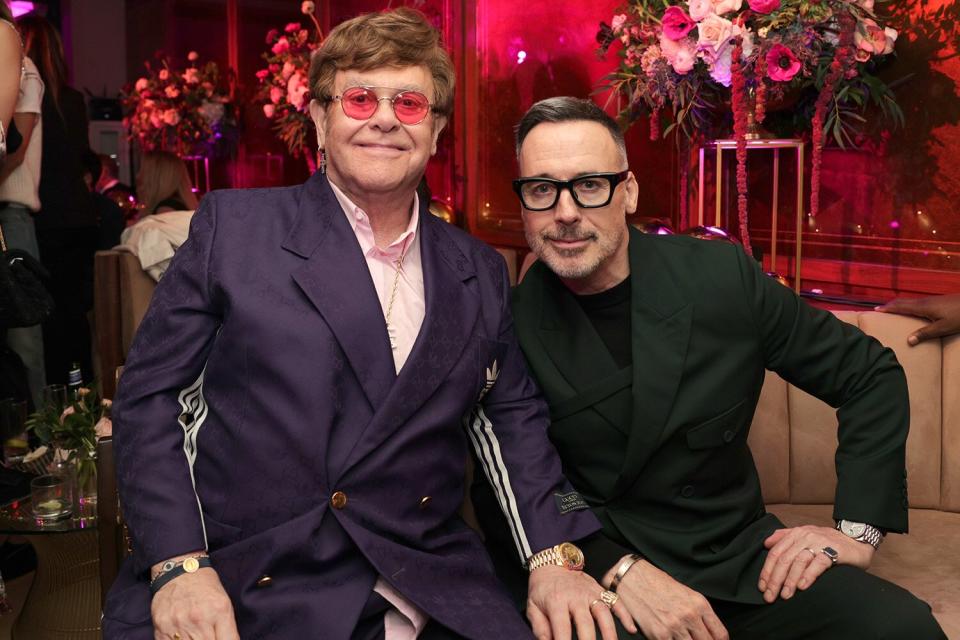 Elton John and David Furnish attend the The CAA Pre-Oscar Party