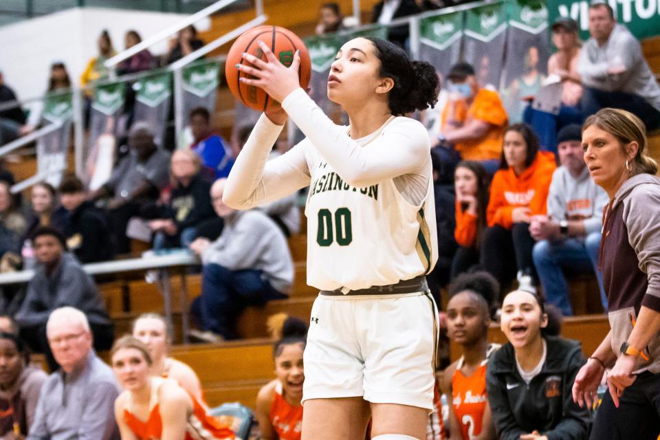 Washington's Zion Belcher-Aril (0) shoots during the Washington vs. Fort Wayne Northrop girls basketball game Wednesday, Jan. 18, 2023 at Washington High School.