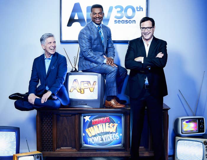 Bob, Tom and Alfonso sit around vintage TVs that are playing their show