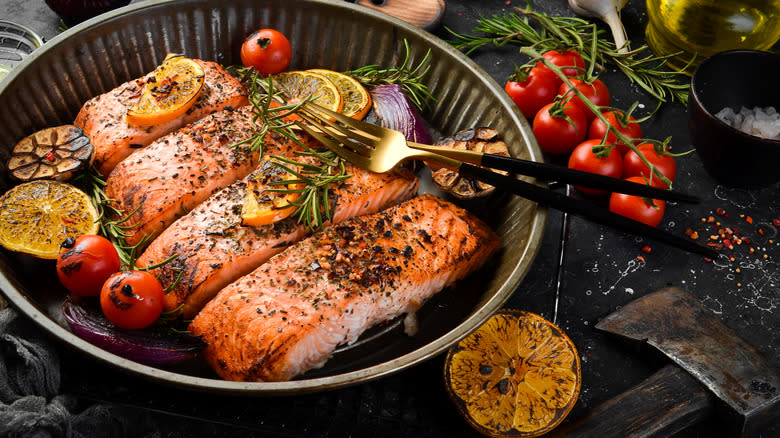 baked salmon filets in tray 