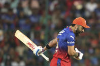 Royal Challengers Bengaluru's Virat Kohli reacts after being bowled out during the Indian Premier League cricket match between Royal Challengers Bangaluru and Sunrisers Hyderabad in Bengaluru, India, Monday, April 15, 2024. (AP Photo/Kashif Masood)