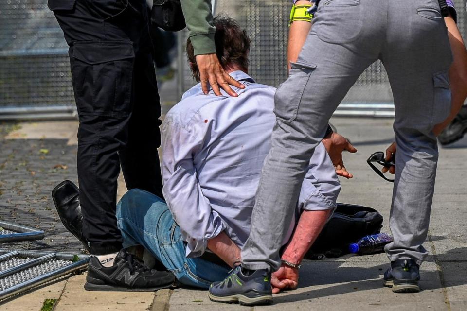 PHOTO: A person is detained after a shooting incident of Slovak Prime Minister Robert Fico, after a Slovak government meeting in Handlova, Slovakia, May 15, 2024. (Radovan Stoklasa/Reuters)