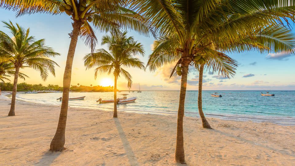 Idyllic Akumal Bay on the Caribbean Sea in the state of Quintana Roo, Mexico, makes an enticing winter escape. Generally, US visitors to planning to fly to Mexico can follow the timing suggestions for the domestic market. - Simon Dannhauer/iStockphoto/Getty Images