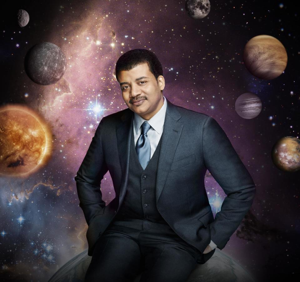 This photo released by Fox shows Neil deGrasse Tyson, the astrophysicist who hosts the television show, "Cosmos: A Spacetime Odyssey," premiering Sunday, March 9, 2014, 9:00-10:00 PM ET/PT on Fox and simultaneously across multiple U.S. Fox networks. The series will explore how we discovered the laws of nature and found our coordinates in space and time. (AP Photo/Fox, Patrick Eccelsine)