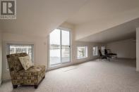 <p><span>10 Armshore Drive, Halifax, N.S.</span><br> On the third level of this four-level home, you’ll find a multipurpose room, ideal to be turned into a family room. It opens to a private balcony. (Photo: Zoocasa) </p>