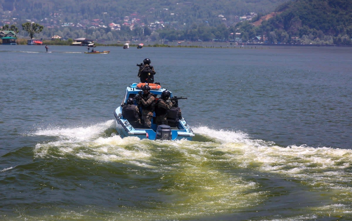 Central Reserve Police Force holds a special drill at Dal Lake ahead of G20 meeting (EPA)