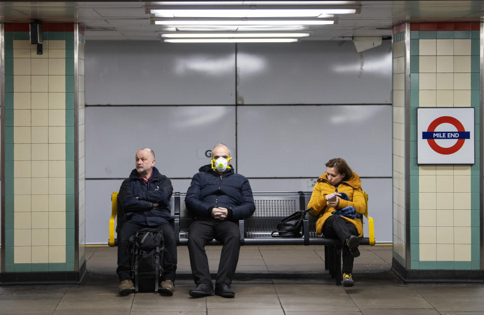 LONDON, ENGLAND - MARCH 23: Commuters wearing face protection masks travel on the Central Line on March 23, 2020 in London, United Kingdom. Coronavirus (COVID-19) pandemic has spread to at least 182 countries, claiming over 10,000 lives and infecting hundreds of thousands more. (Photo by Justin Setterfield/Getty Images)