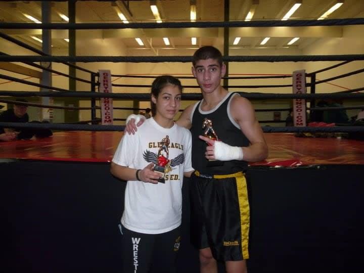 Sara Haghighat-Joo stands next to her brother Sasan Haghighat-Joo. She says she decided to get into professional boxing when her brother died in September 2023.  (Submitted by Sara Haghighat-Joo - image credit)