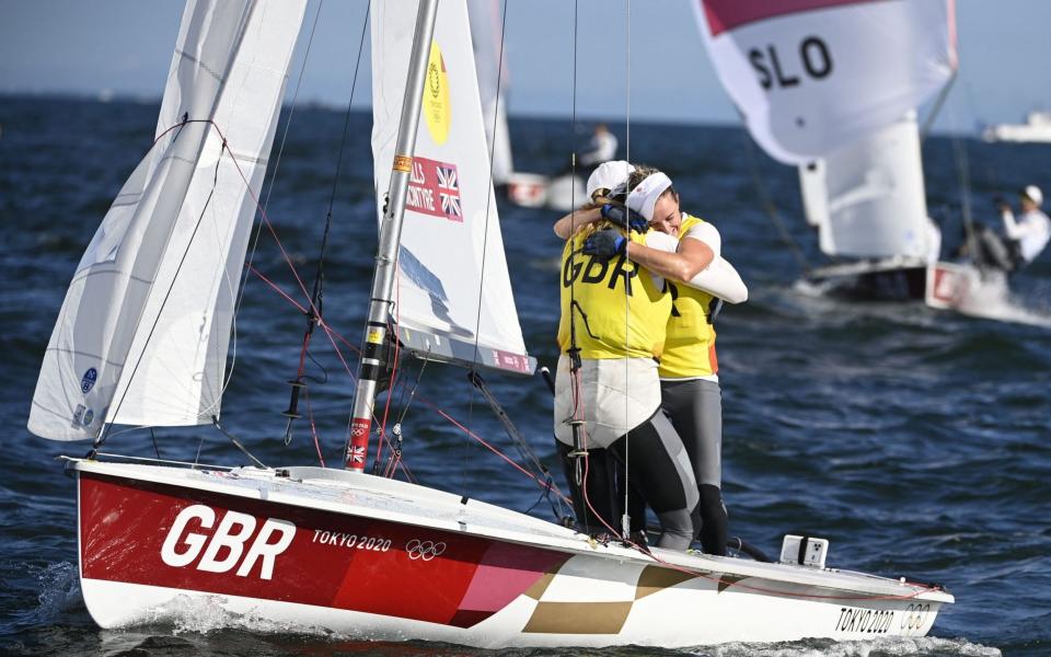 Hannah Mills and Eilidh Mcintyre celebrate after clinching gold  - AFP