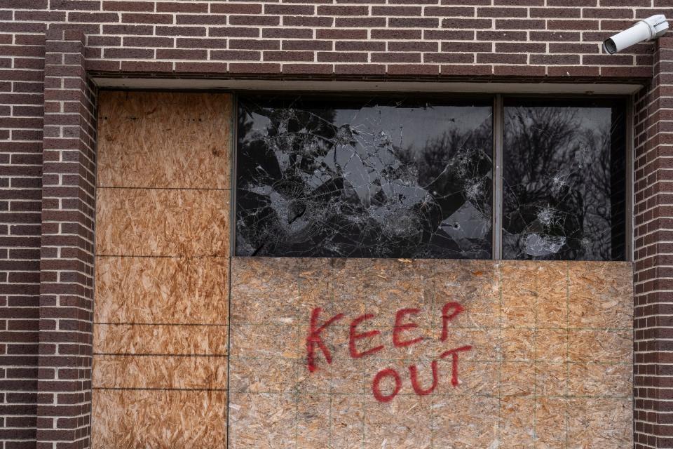 On Thursday, April 18, 2024, broken windows and litter surround the former Flint Northern High School in Flint, which sits abandoned after closing. The school building has had fires multiple times.