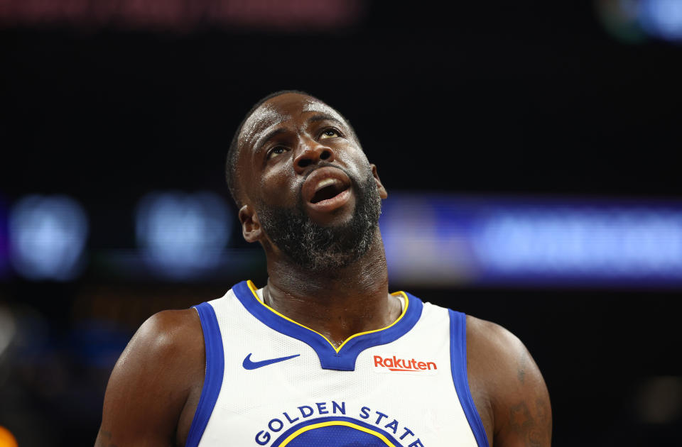 Dec 12, 2023; Phoenix, Arizona, USA; Golden State Warriors forward Draymond Green (23) reacts against the Phoenix Suns at Footprint Center. Mandatory Credit: Mark J. Rebilas-USA TODAY Sports