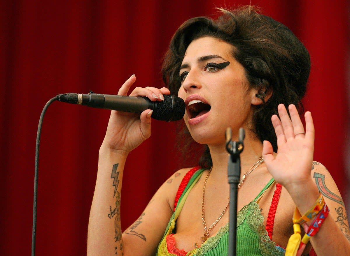 Amy Winehouse performs at the Glastonbury, 2007 (AFP via Getty Images)