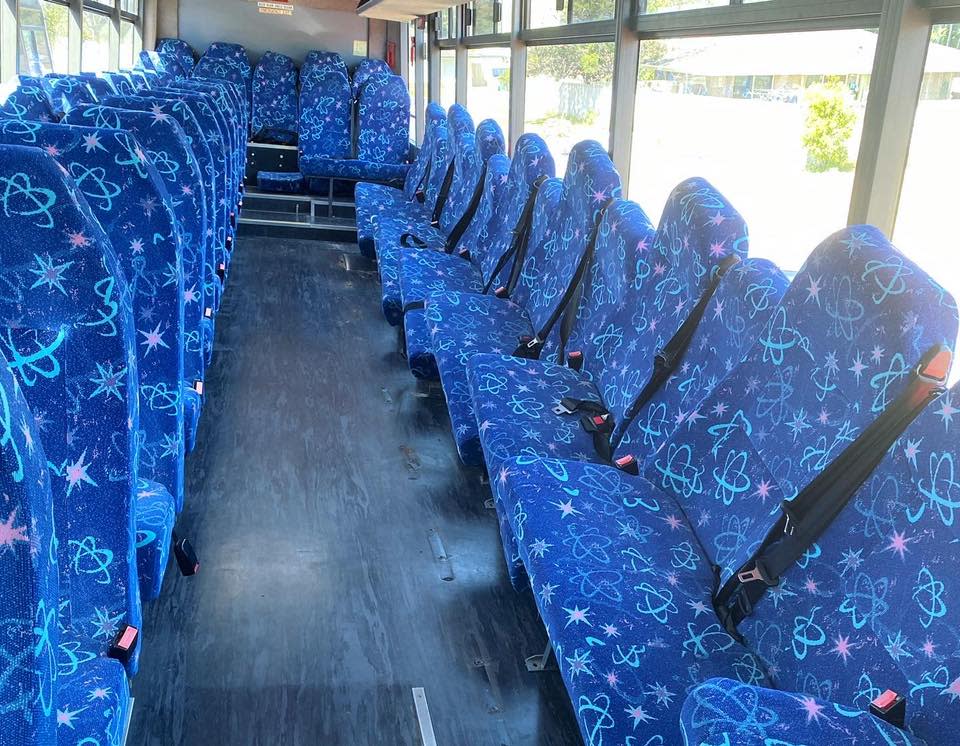 The interior of the Pascoe family bus before removing the seats