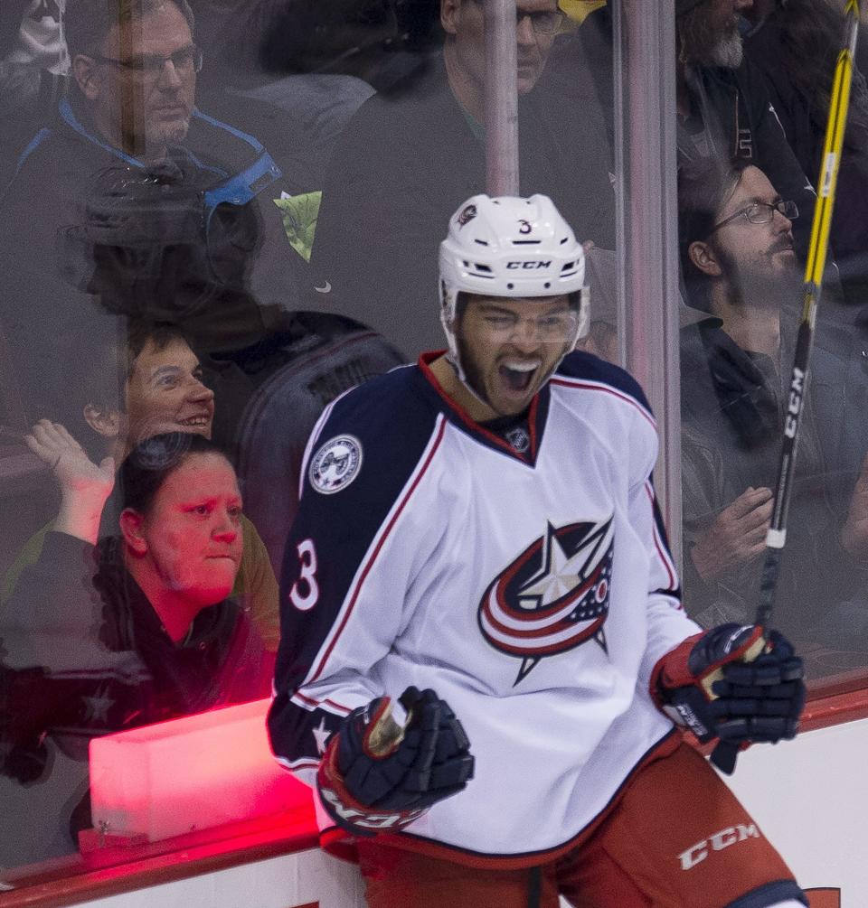 Columbus Blue Jackets defenseman Seth Jones (3) celebrates his goal against the Vancouver Canucks in overtime of an NHL hockey game, Sunday, Dec. 18, 2016 in Vancouver, British Columbia. (Jonathan Hayward/The Canadian Press via AP)