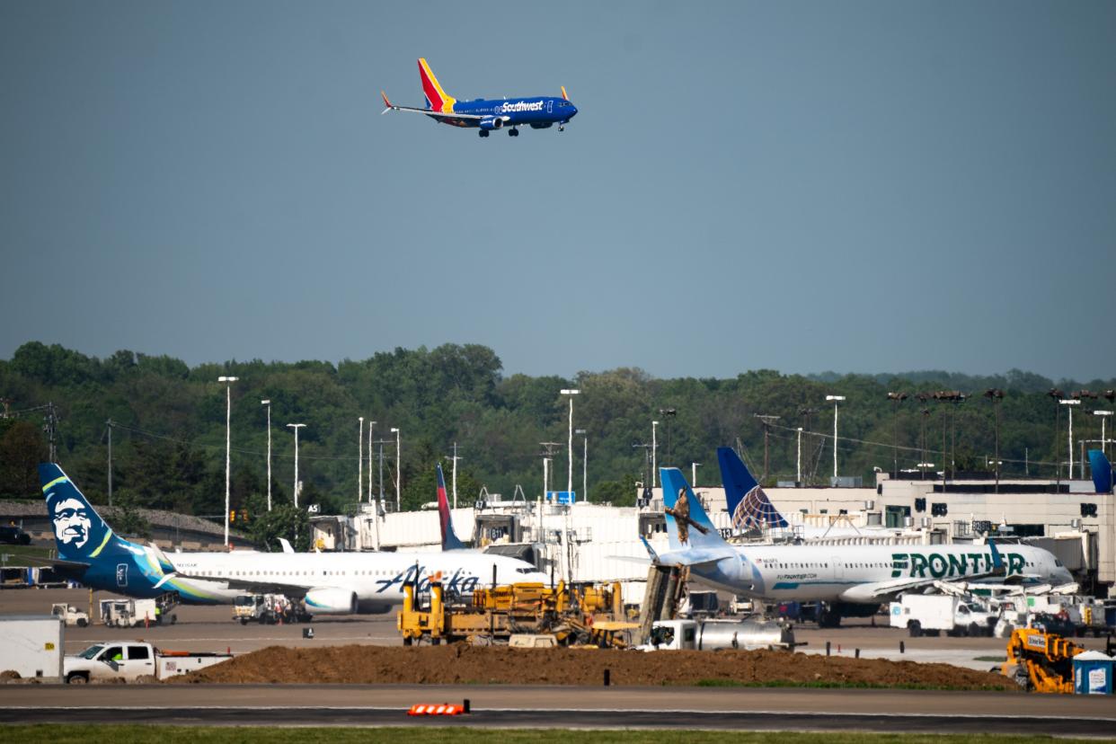 A Southwest Airlines flight lands at Nashville International Airport. The airport will handle almost 24 million passengers this year, officials say.
