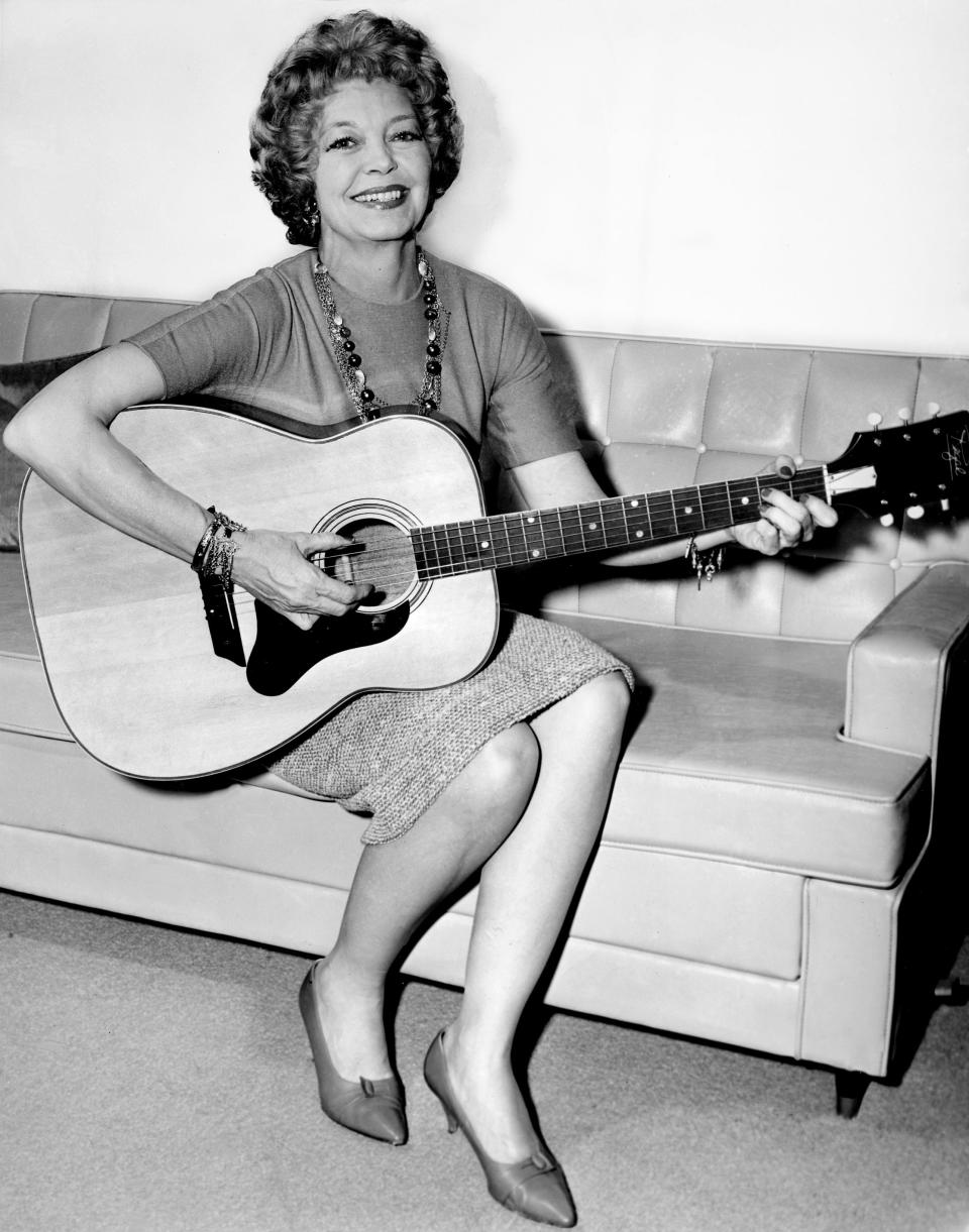 Texas songwriter Cindy Walker, who writes songs just as well in one place as another, tries a new tune during one of her frequent visits to Nashville June 21, 1963. Walker, who has more than 400 published songs to her credit, spends about three months out of each year in Nashville.