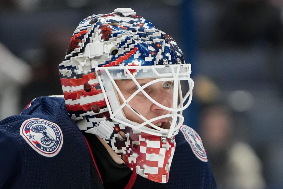 Dec 5, 2023; Columbus, Ohio, USA; Columbus Blue Jackets goaltender Elvis Merzlikins (90) watches a face off during the second period of the NHL game against the Los Angeles Kings at Nationwide Arena.