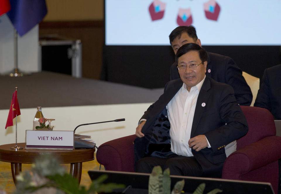 Vietnam Foreign Minister Phạm Binh Minh attends the ASEAN Foreign Ministers' retreat in Chiang Mai, Thailand Friday, Jan. 18, 2019. (AP Photo/Gemunu Amarasinghe)