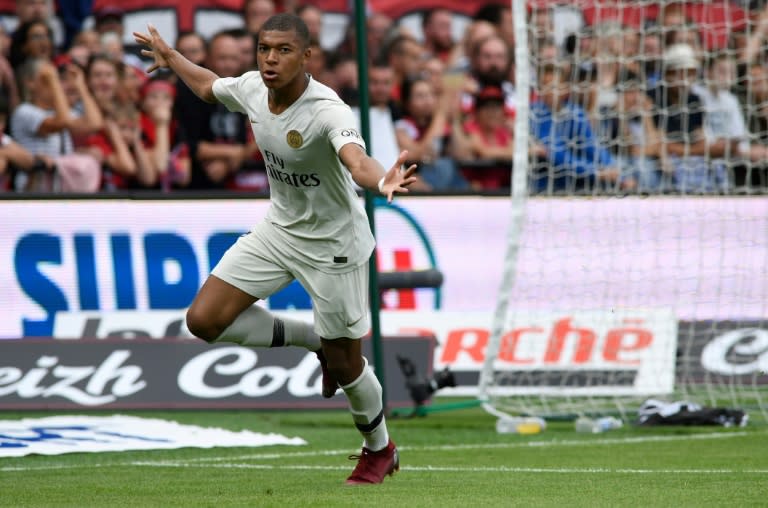 Kylian Mbappe celebrates after putting PSG ahead against Guingamp