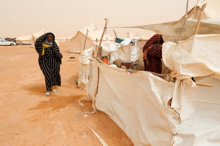 Libyan women displaced from the town of Tawergha are seen at a camp in the Garart al-Gatef, Libya March 25, 2018. REUTERS/Ismail Zitouny
