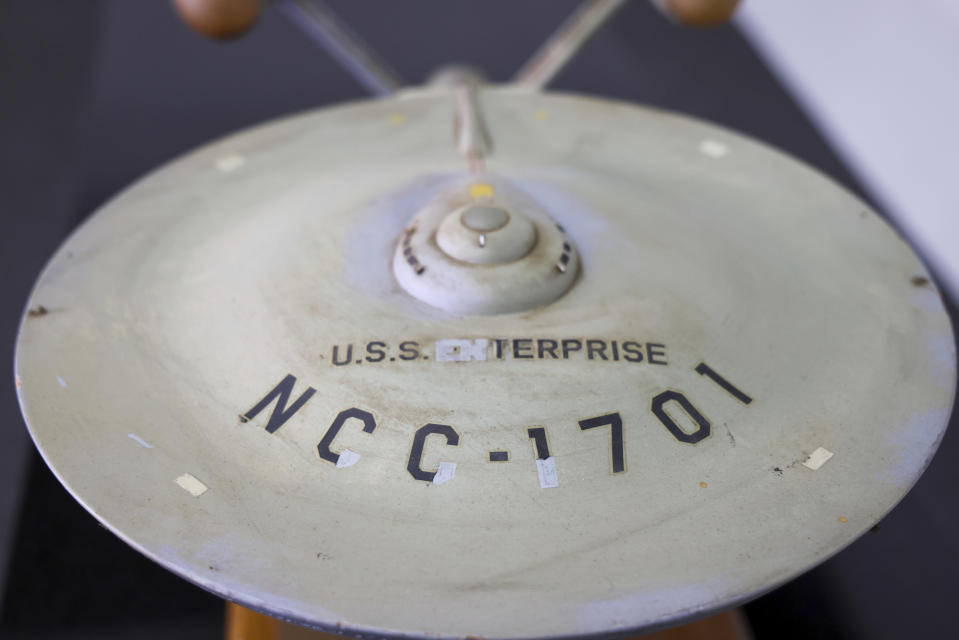 The first model of the USS Enterprise is displayed at Heritage Auctions in Los Angeles, April 13, 2024. The model — used in the original “Star Trek” television series — has been returned to Eugene “Rod” Roddenberry, the son of “Star Trek” creator Gene Roddenberry, decades after it went missing in the 1970s. (Josh David Jordan/Heritage Auctions via AP)