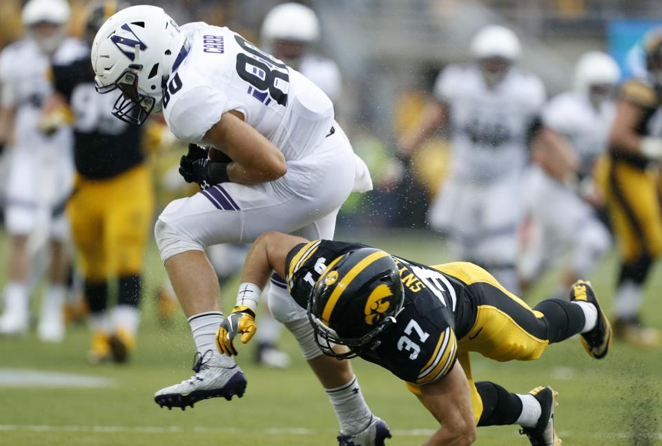 Northwestern wide receiver Austin Carr caught three touchdowns in a 38-31 win over Iowa. (AP Photo/Charlie Neibergall)