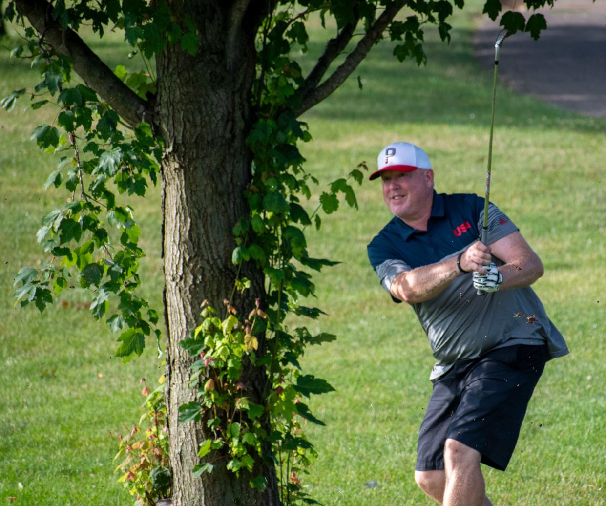 Matt Seifers hits on the third hole at Cascades Golf Course in the Bloomington City Golf Tournament on July 9, 2023.