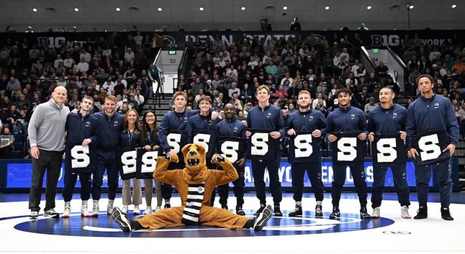 Penn State celebrates all of its seniors, which included Penns Valley graduate Baylor Shunk (seventh from left), before the Nittany Lions routed Edinboro, 55-0, on Sunday inside Rec Hall. Steve Manuel/For the CDT