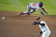 Washington Nationals' Yadiel Hernandez (29) advances past New York Yankees' Gleyber Torres to reach second base on a fielding error by Aaron Judge during the eighth inning of a baseball game Friday, May 7, 2021, in New York. (AP Photo/Frank Franklin II)