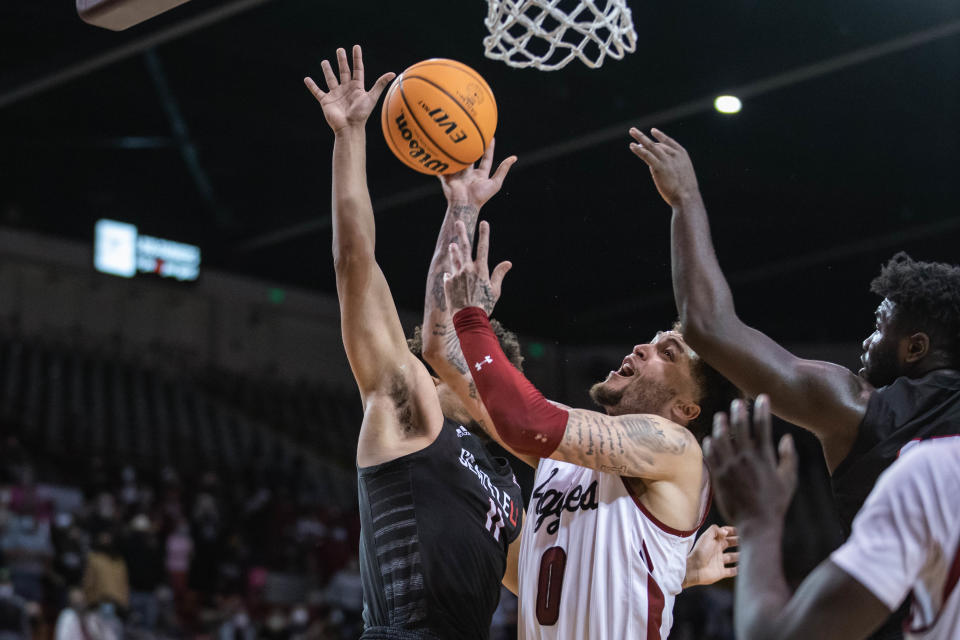 Teddy Allen (0) goes up for a layup as the New Mexico State Aggies face off against the Seattle Red Hawks at the Pan American Center in Las Cruces on Saturday, Feb. 5, 2022.