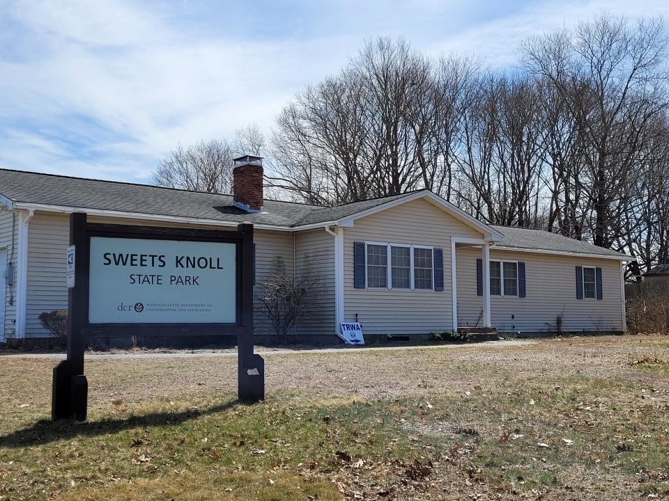 The entrance to Sweets Knoll State Park on Somerset Avenue. The building on site was once a single-family home and now houses the office of the Taunton River Watershed Alliance.
