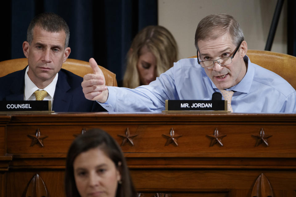 Rep. Jim Jordan, R-Ohio, right, questions Jennifer Williams, an aide to Vice President Mike Pence, and National Security Council aide Lt. Col. Alexander Vindman, as they testify before the House Intelligence Committee on Capitol Hill in Washington, Tuesday, Nov. 19, 2019, during a public impeachment hearing of President Donald Trump's efforts to tie U.S. aid for Ukraine to investigations of his political opponents. Seated to the left looking on is Steve Castor, the Republican staff attorney. (Shawn Thew/Pool Photo via AP)