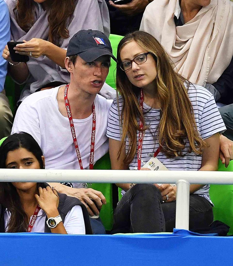 Eddie Redmayne and wife Hannah Bagshawe attend the Men's 100m Breaststroke on August 7, 2016 in Rio de Janeiro, Brazil