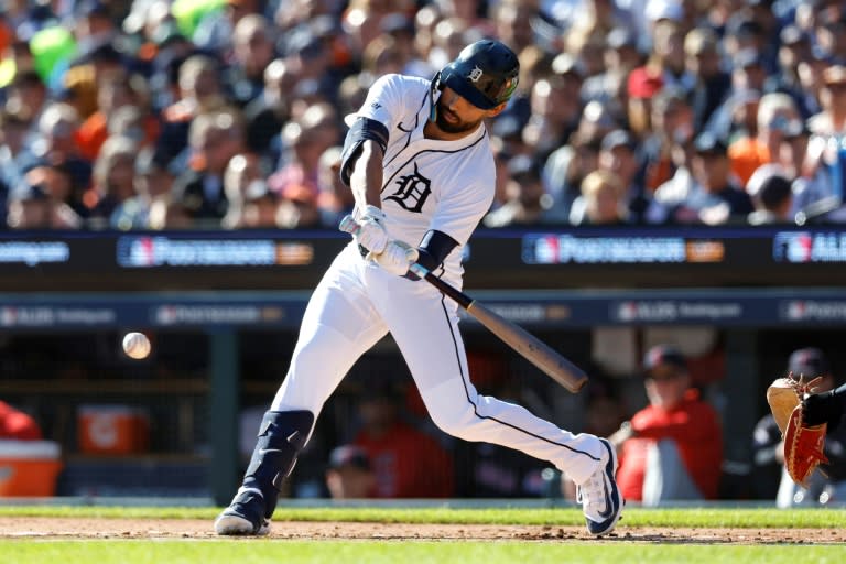 Detroit's Riley Greene hits a single to drive in a run in the first inning of the Tigers' Major League Baseball playoff victory over Cleveland (Duane Burleson)