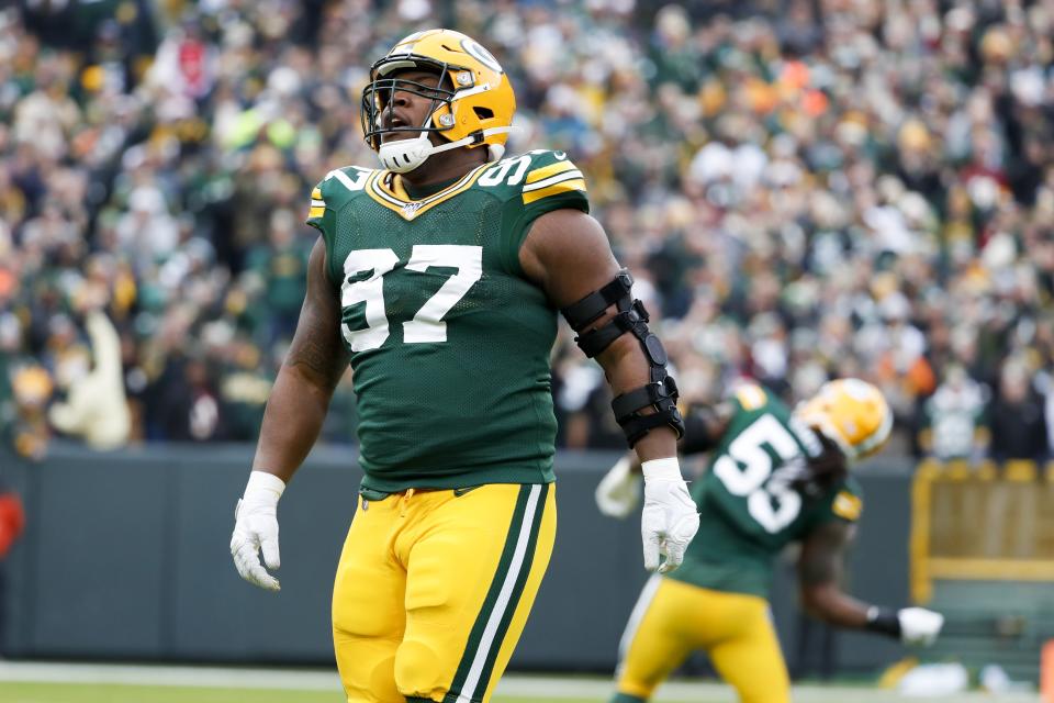 Green Bay Packers' Kenny Clark found an unusual way to stay in shape. (AP Photo/Matt Ludtke)