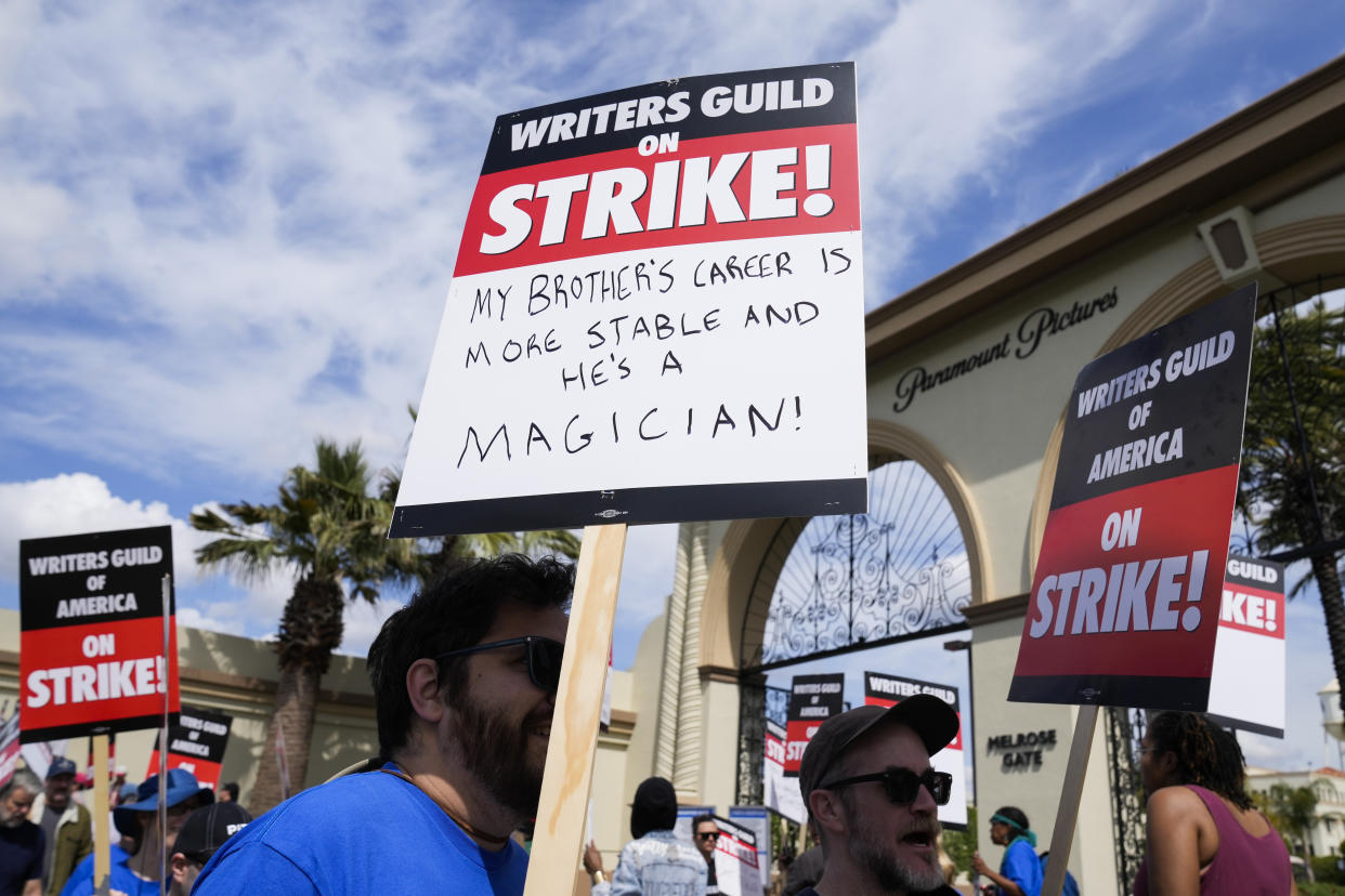 Members of the The Writers Guild of America picket outside Paramount Pictures on Wednesday, May 3, 2023, in Los Angeles. Television and movie writers declared late Monday, May 1, that they will launch an industrywide strike for the first time in 15 years, as Hollywood girded for a walkout with potentially widespread ramifications in a fight over fair pay in the streaming era.(AP Photo/Ashley Landis)