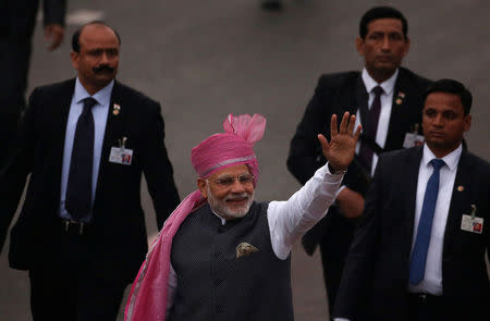 FILE PHOTO - Indian Prime Minister Narendra Modi waves towards the crowd as he leaves after attending the Republic Day parade in New Delhi, India January 26, 2017. REUTERS/Adnan Abidi/File Photo