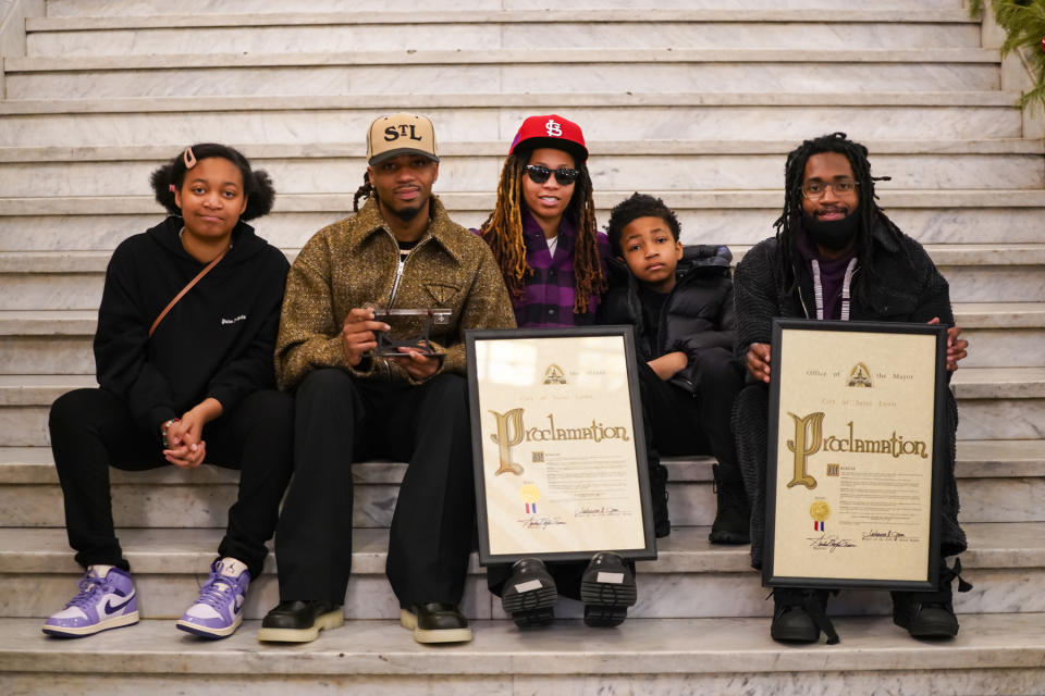 Metro Boomin receives the key to the city of St. Louis alongside his siblings Lauren, 13; Leah, 27; Logan, 9; and Landon, 25 (from left)