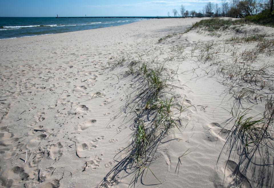 Looking south to the southern sand repository area of Neshotah Beach Park, Thursday, May 13, 2021, in Two Rivers, Wis.