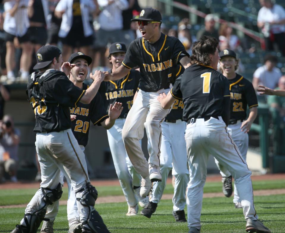 Greece Athena players celebrate after the final out Saturday, May 27, 2023, as they won the Section V Class A1 championship. They defeated Churchville-Chili, 11-4, at Innovative Field in Rochester.