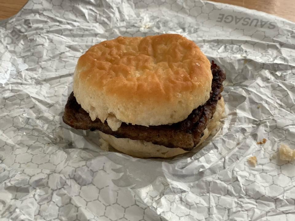 Wendy's sausage biscuit on a white wrapper