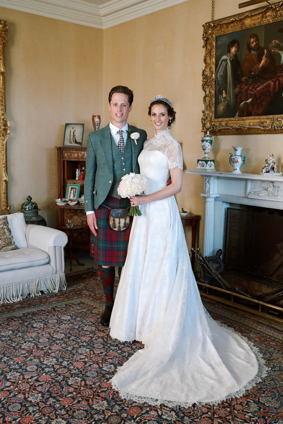 a man and woman in formal wear