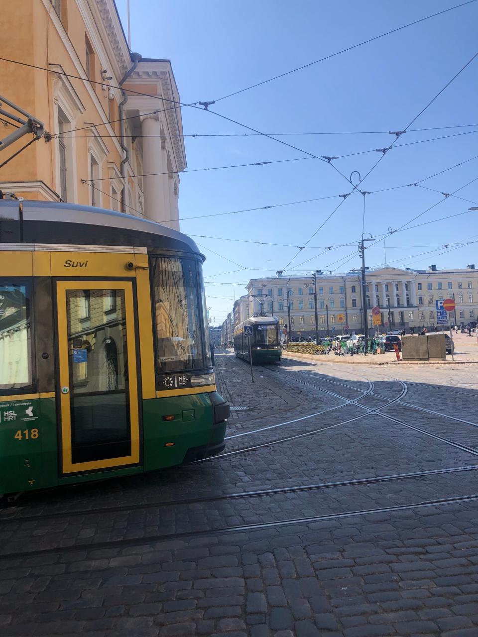 Two trams cross in Helsinki Finland